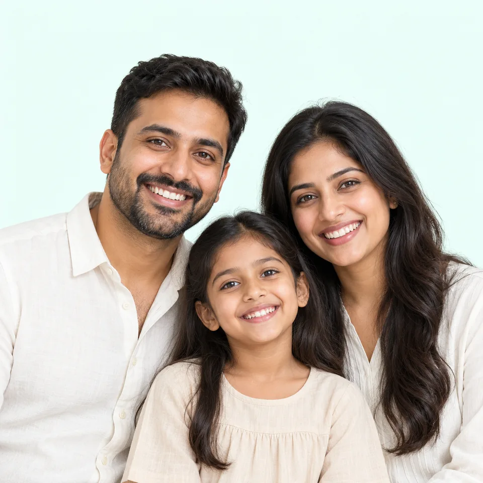Smiling Indian family showing their healthy teeth